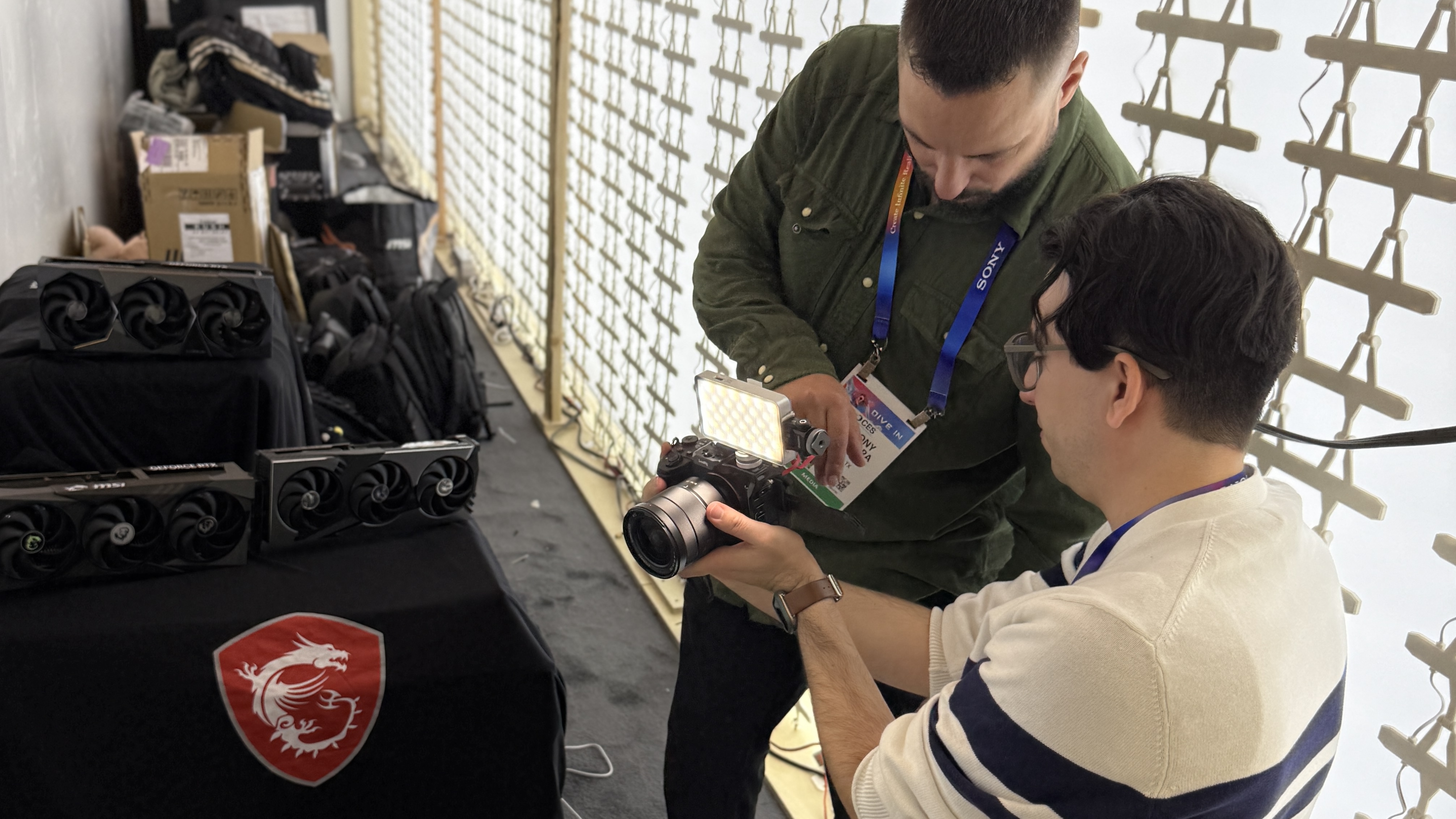 A Viltrox Retro series RGB light mounted next to a camera setup.