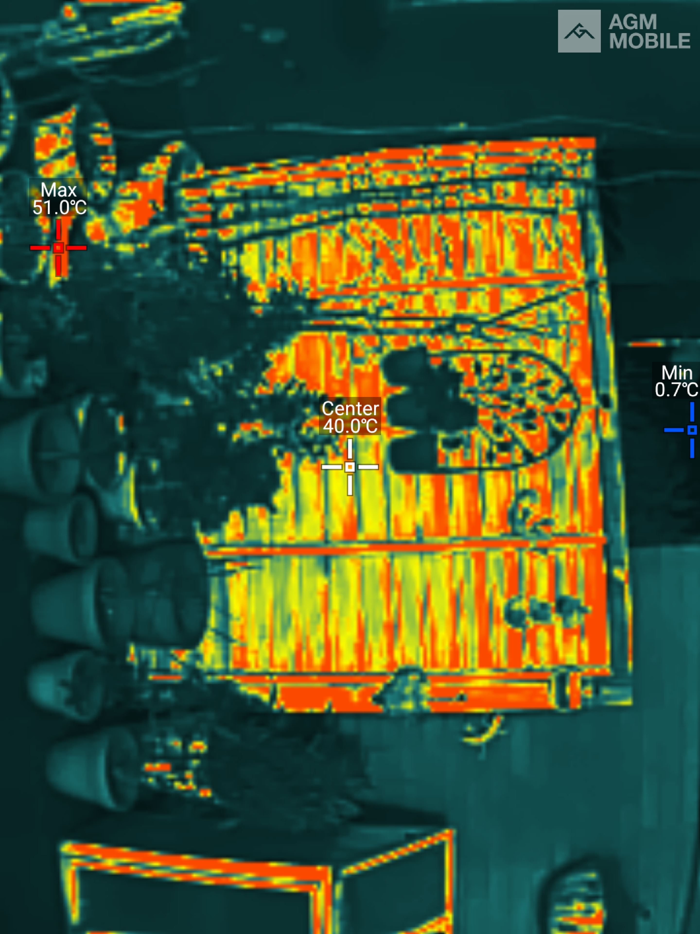 A demonstration of thermal imaging showing heat signatures on a mobile screen.