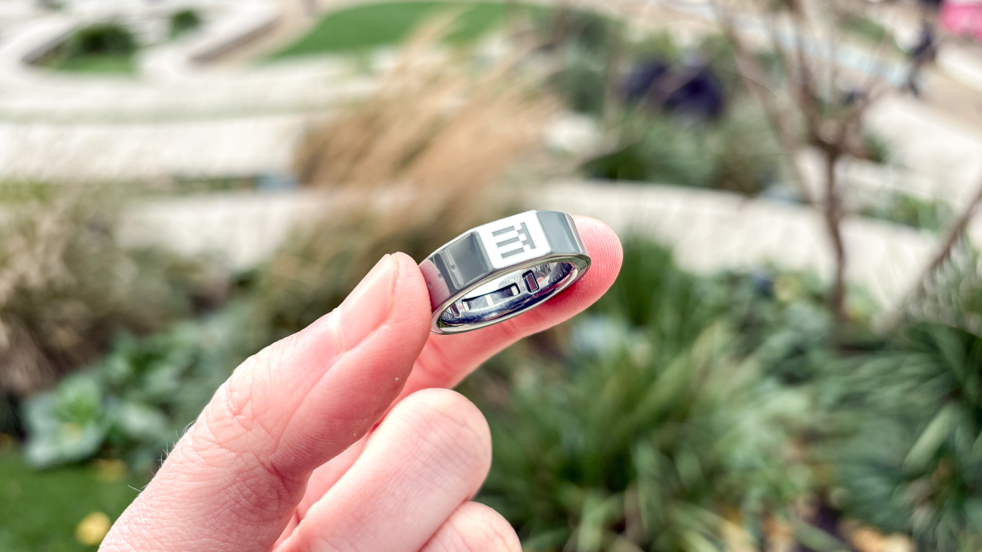 The Even Realities R1 smart ring being worn on a finger.