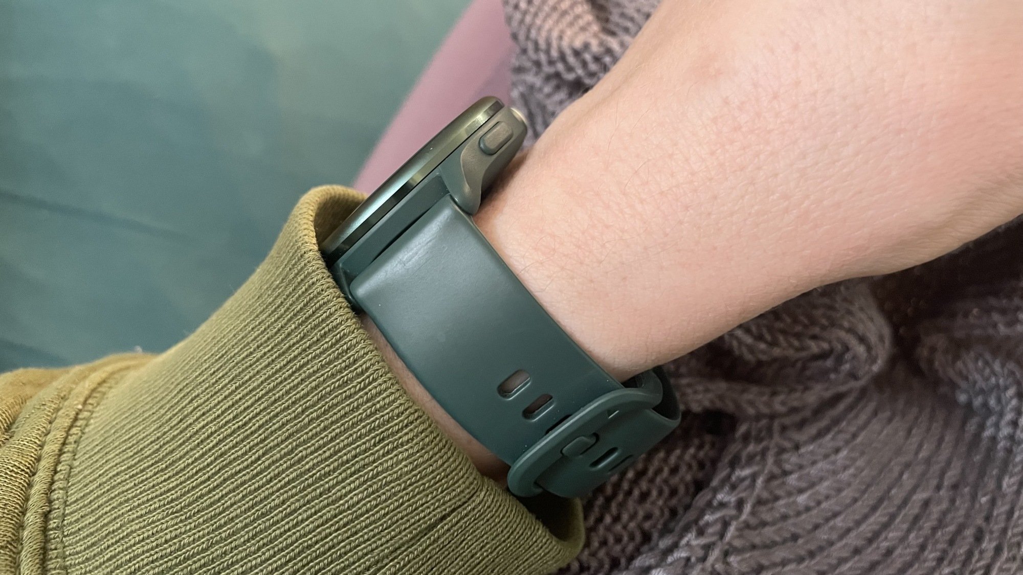 A side-angle view of the Garmin Vivoactive 6 highlighting its slim 42mm case design.