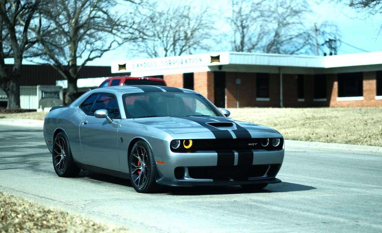 A high-detail close-up of the intake and cylinder head covers of a modern SRT HEMI V8 engine.