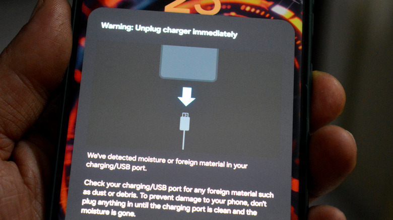 Samsung system notification warning to unplug charger because moisture or foreign material was detected in the port.