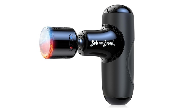The Bob and Brad Q2 Pro Mini massage gun with its compact attachments.