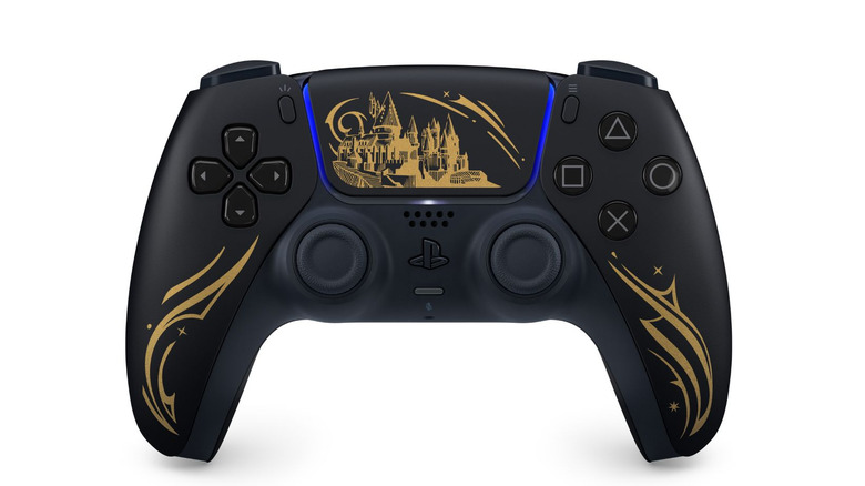 Hogwarts Legacy Limited Edition DualSense controller with gold wizarding patterns on a black shell.