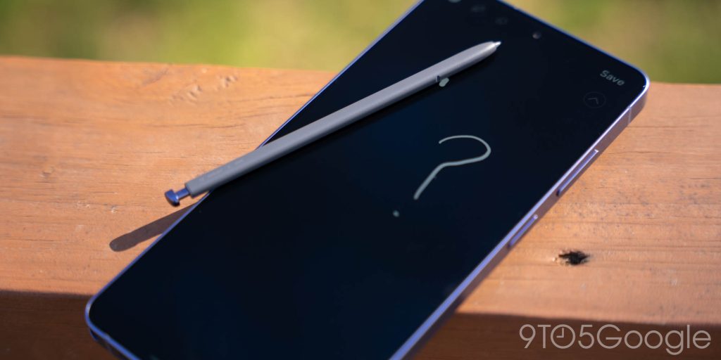 A hand using the S Pen on the large display of the Galaxy S26 Ultra.