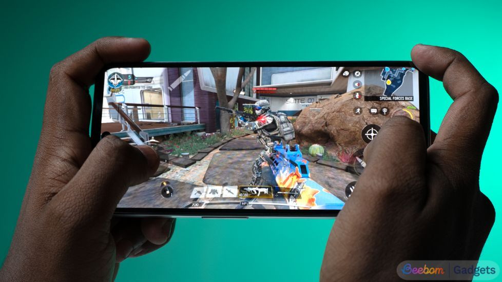 A person playing Call of Duty Mobile on the CMF Phone 2 Pro in landscape mode.