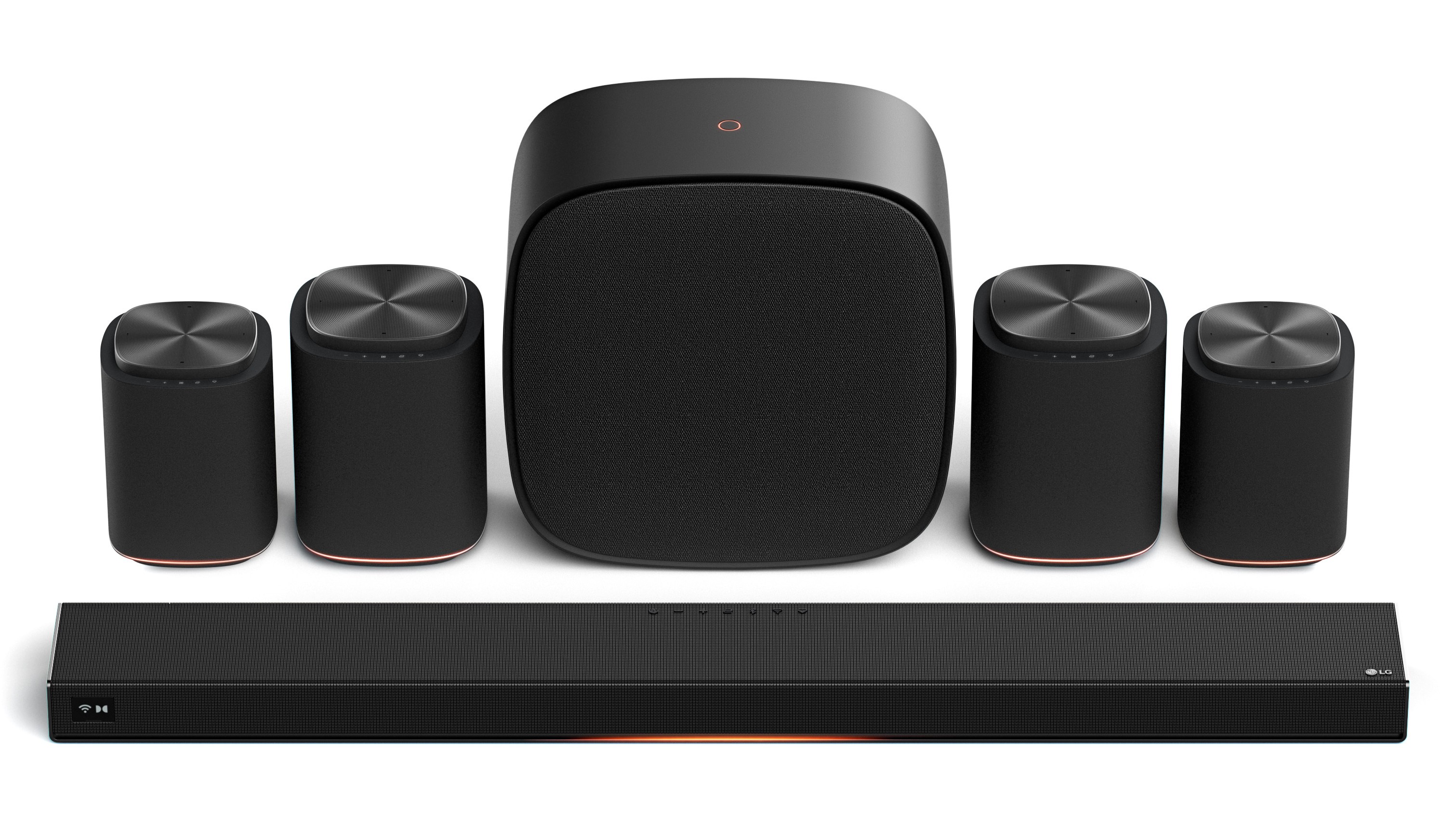 A group photo of the LG Sound Suite family including various speaker sizes and a soundbar.