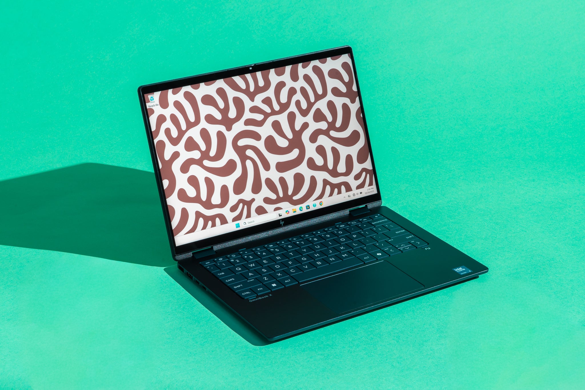 The sleek black chassis of the HP OmniBook X Flip 14-inch laptop.