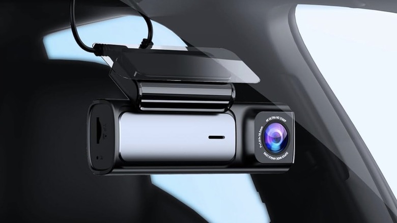 An Affver 4K dash cam mounted inside a car with the screen displaying a clear road view.