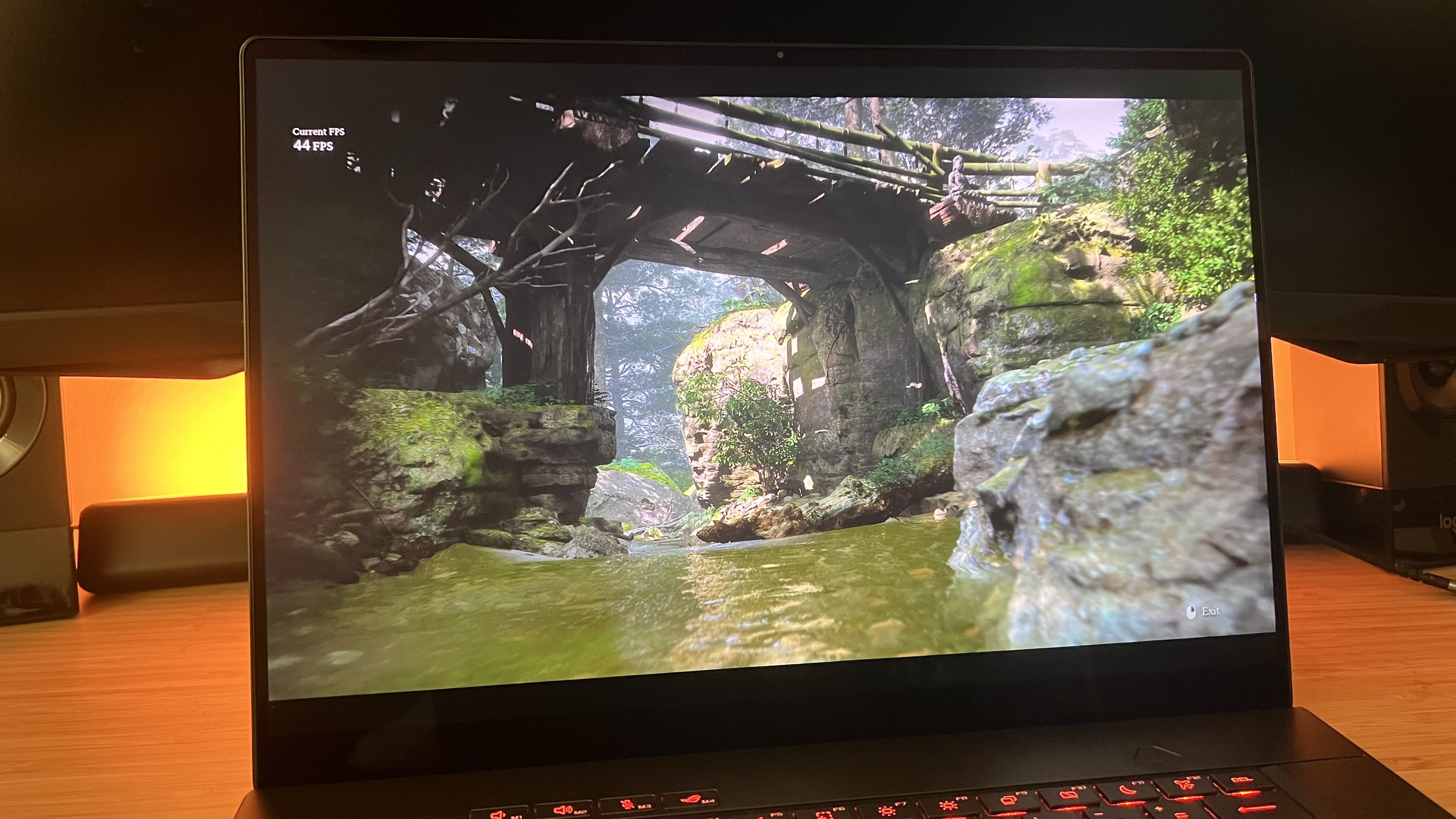 A gaming laptop running the Black Myth Wukong benchmark tool.