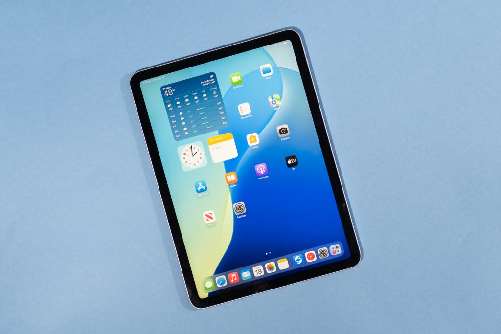The 11-inch Apple iPad Air M3 turned on and displaying the iPadOS home screen.