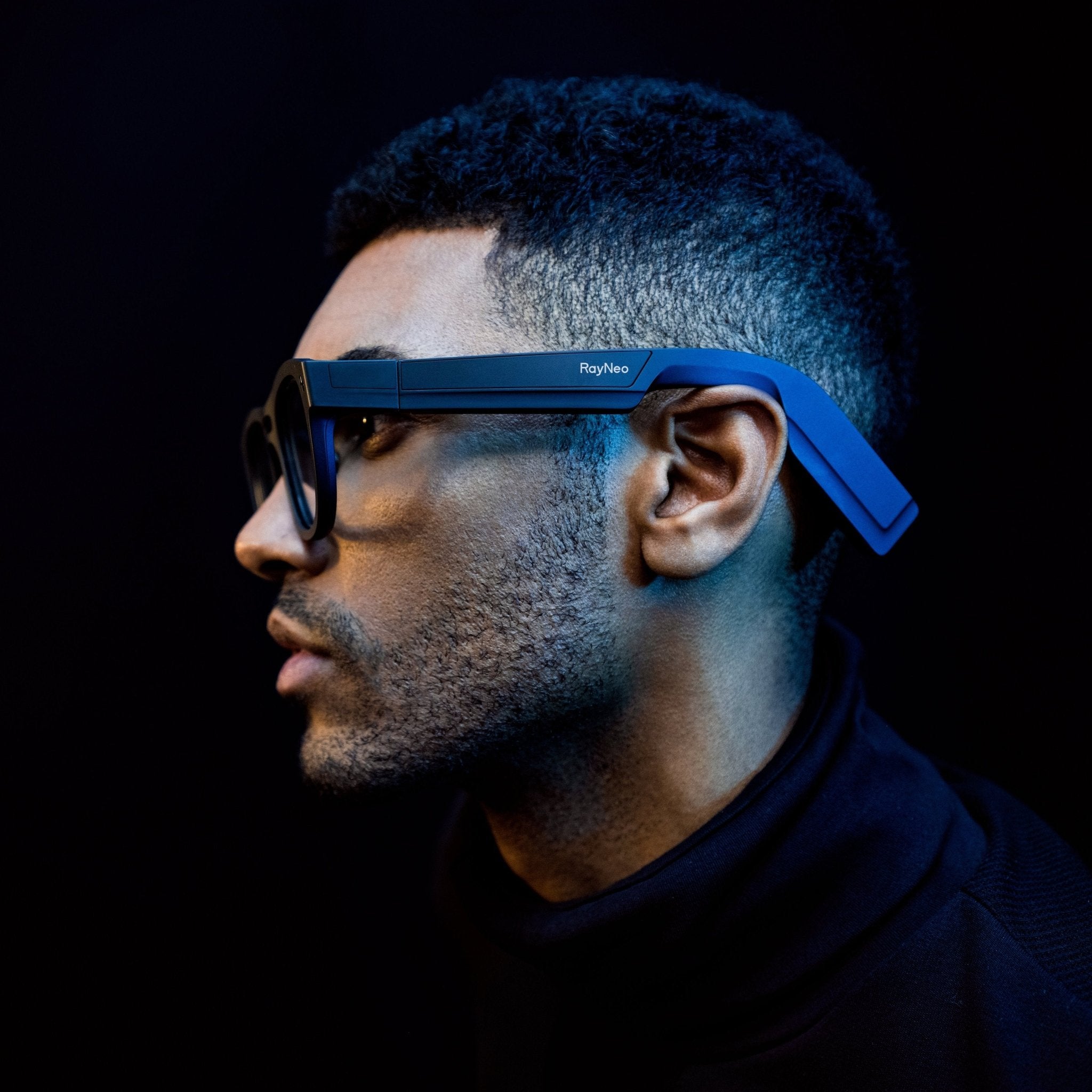 A person using RayNeo X2 glasses in a typical outdoor real-world setting