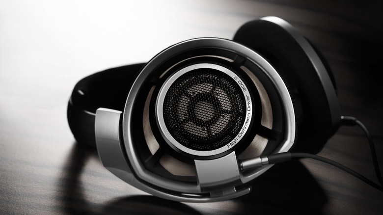 Sennheiser HD 800 S open-back headphones on a wooden table.