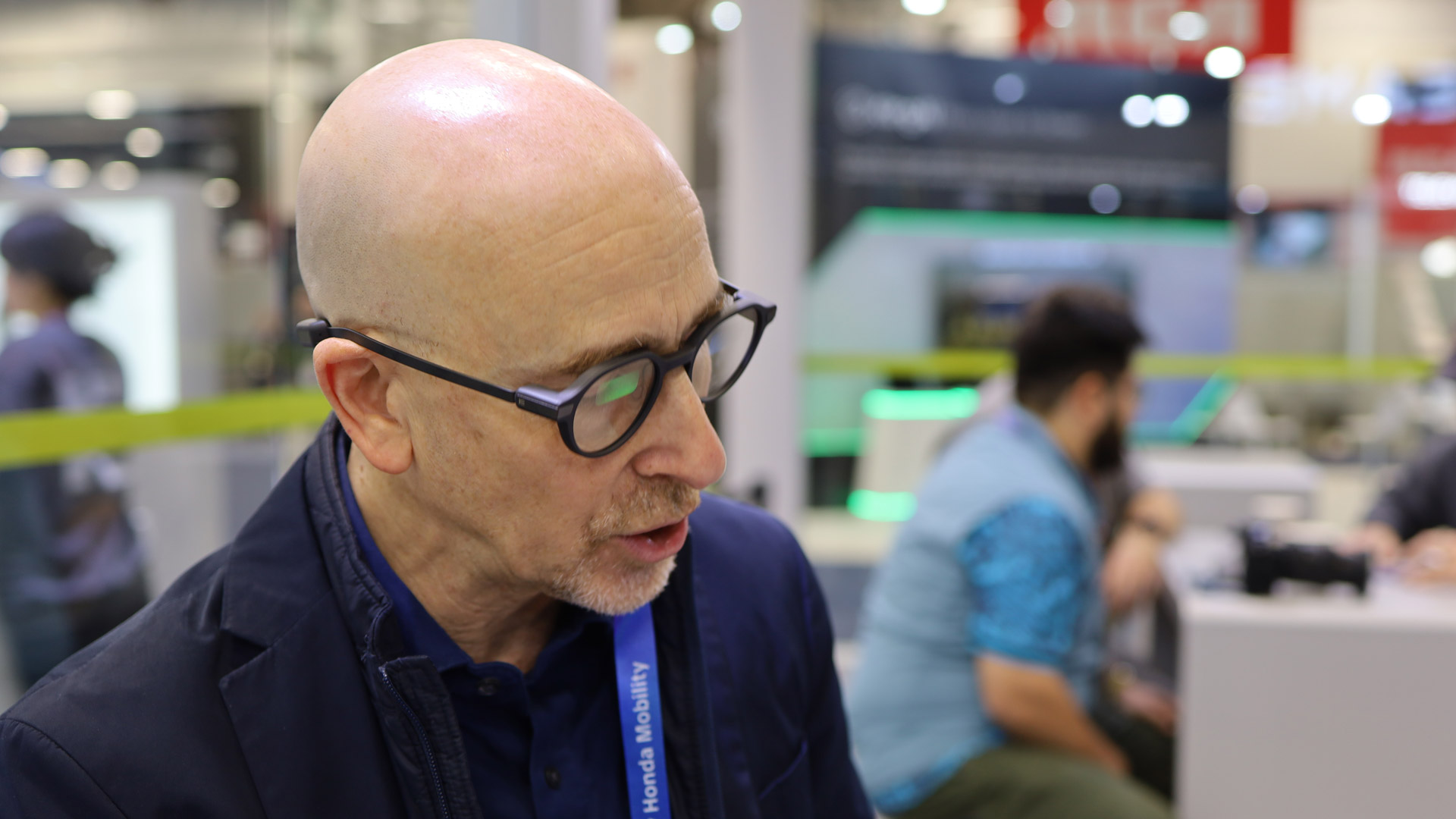 A minimalist studio shot of the Even Realities G2 smart glasses showing the thin titanium frames.