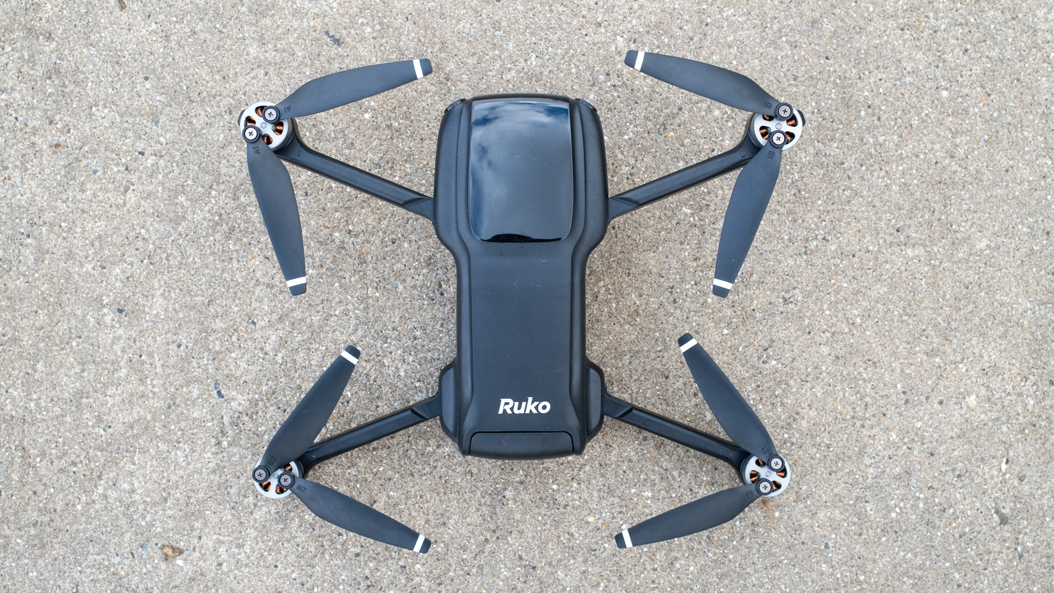 Close-up of the Ruko U11MINI drone camera and stabilizing gimbal assembly.