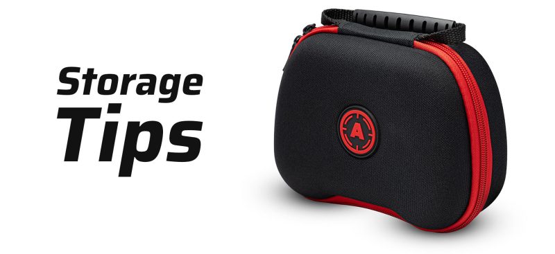 A gaming controller stored securely inside a hard-shell protective carrying case.