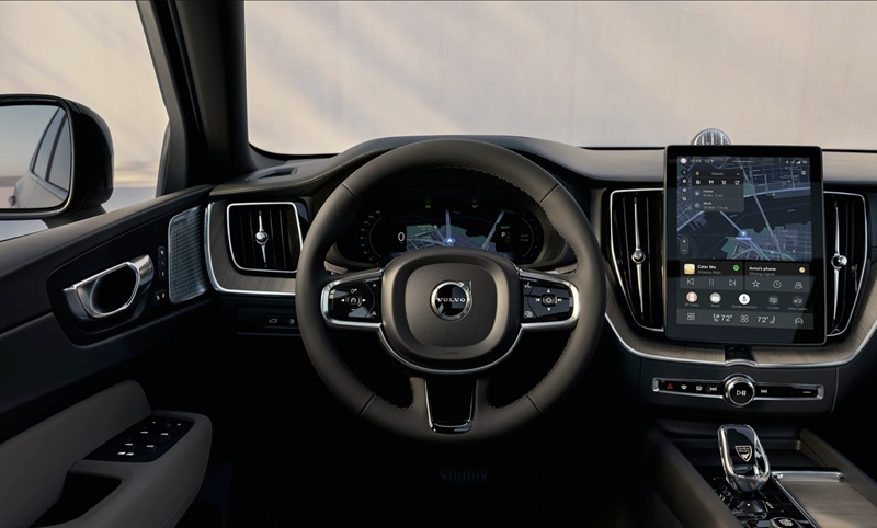 Interior view of the 2026 Volvo XC60 dashboard and center console with the infotainment screen visible.