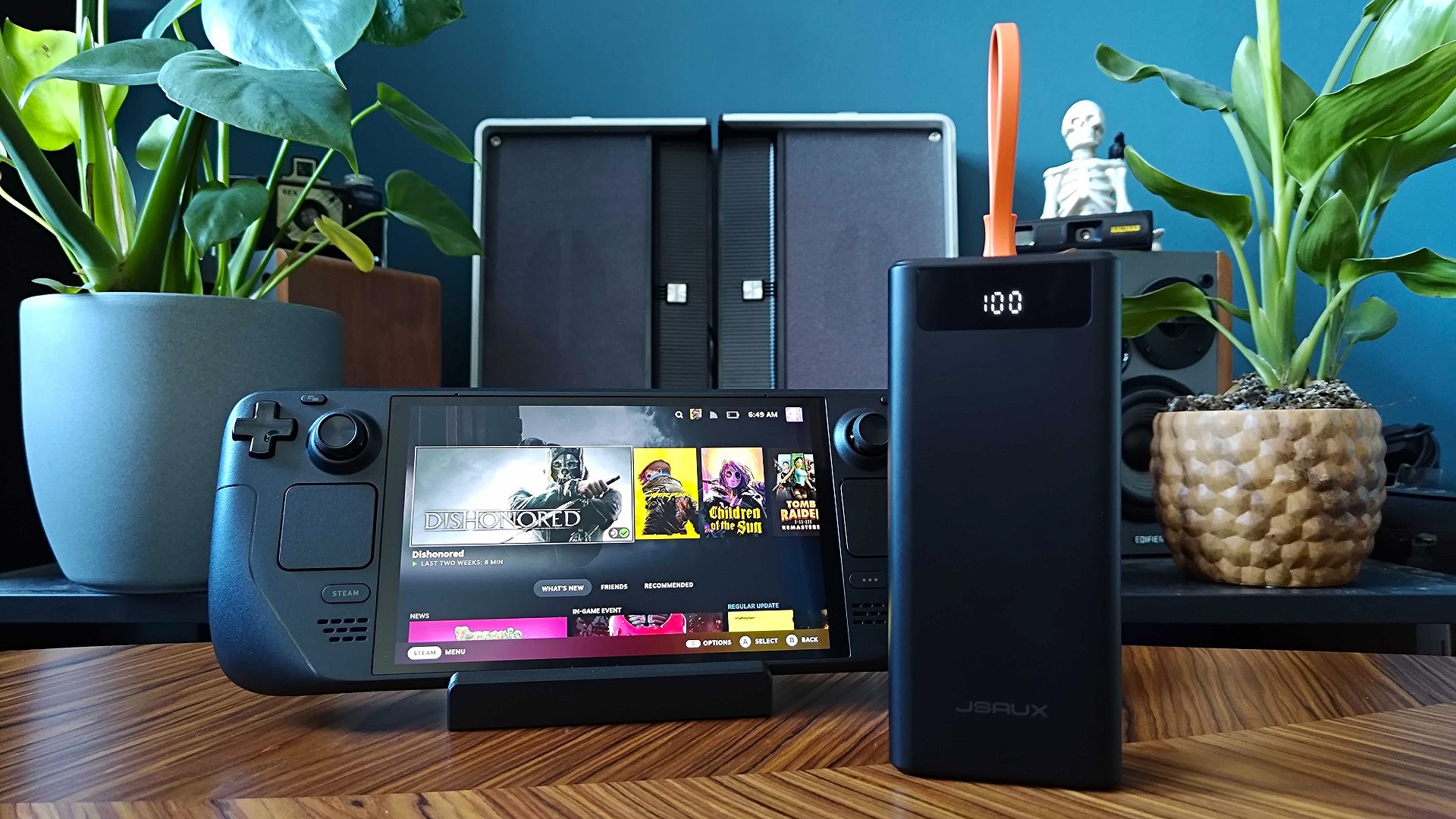 A 20,000mAh Jsaux power bank connected to a Steam Deck OLED.