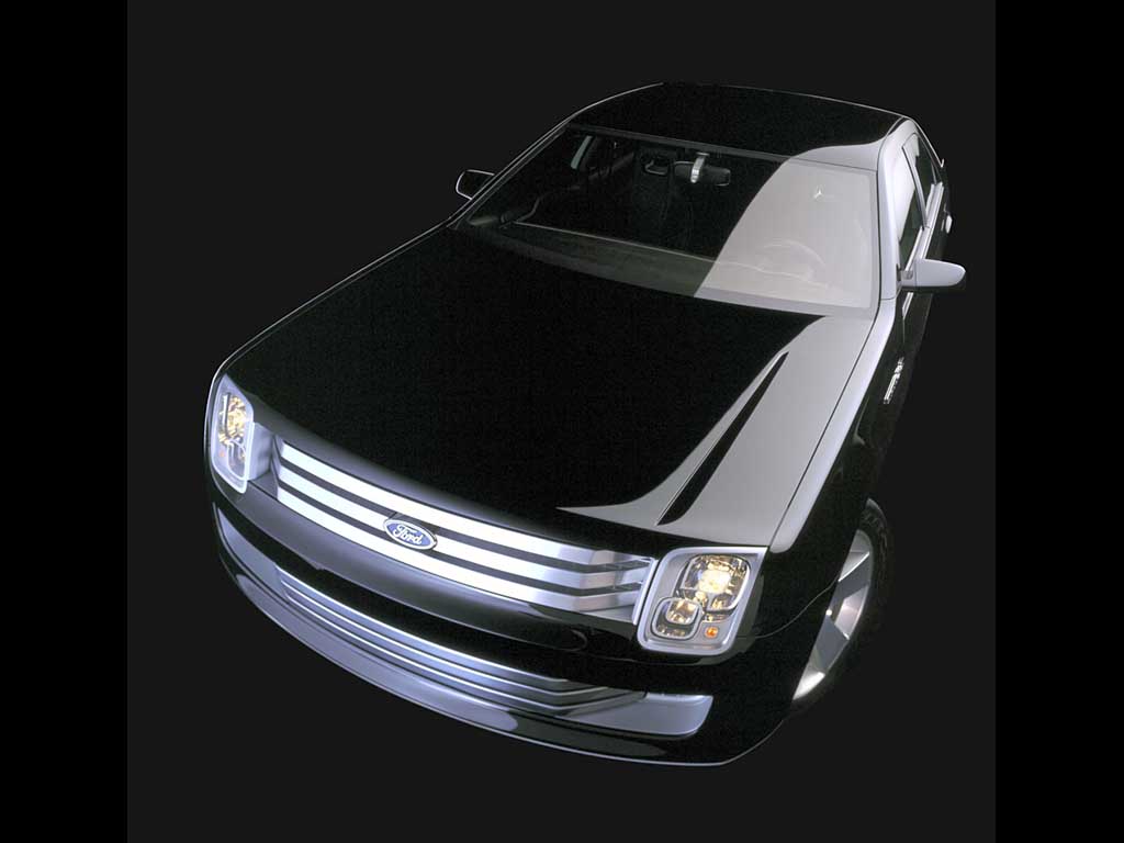 Interior view of the Ford 427 Concept showing black leather bucket seats and center console.