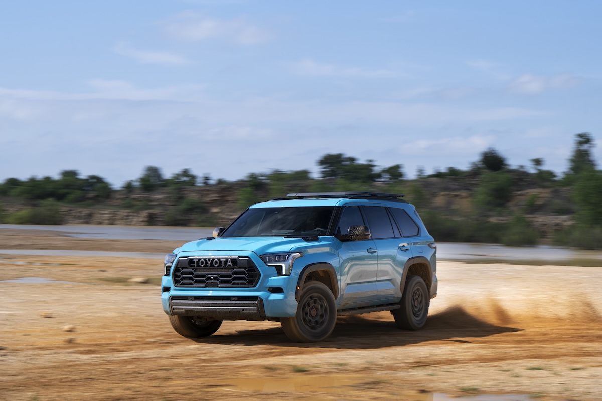 A 2026 Toyota Sequoia SUV showcased in a natural landscape.