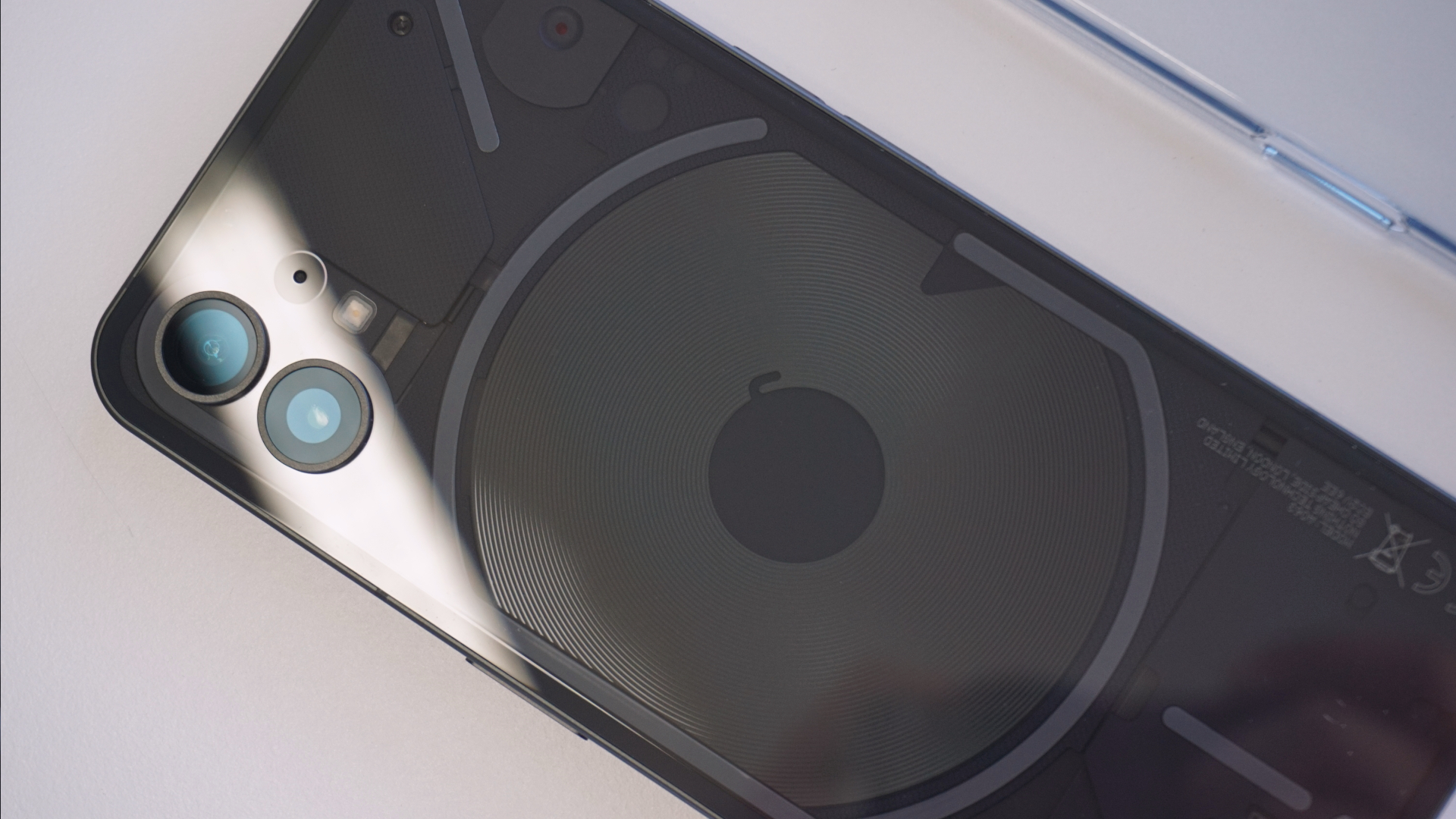 Close-up of the dual-lens camera module on the back of a Nothing Phone.