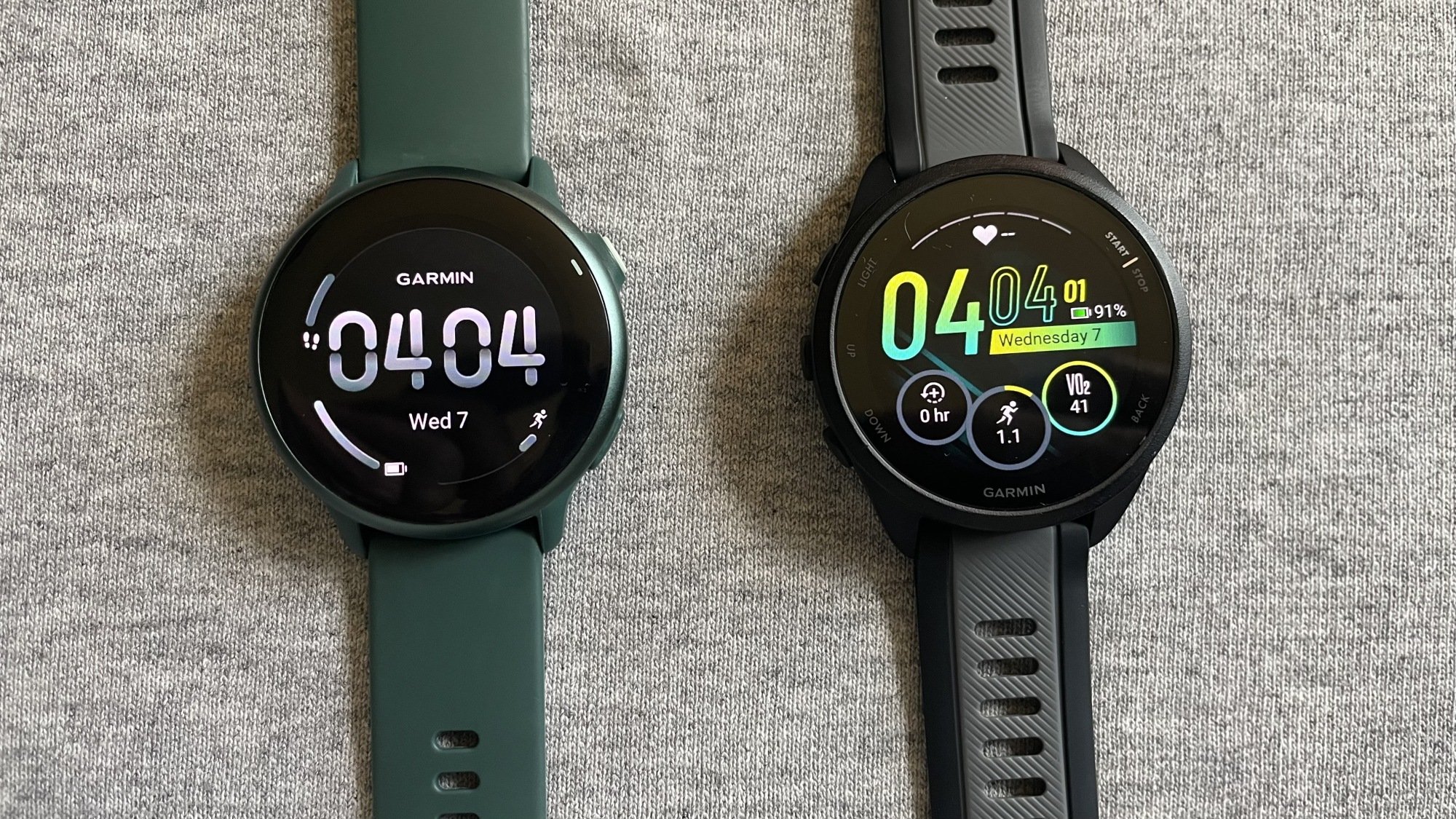 A side-by-side comparison of the Garmin Vivoactive 6 and the Forerunner 165.