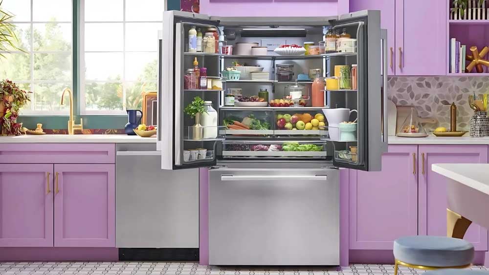 Interior view of an LG counter-depth refrigerator showing shelves, drawers, and organized groceries.