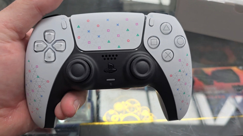 Close-up of the Sony employee exclusive Play Has No Limits DualSense controller showing patterned grip and touchpad.