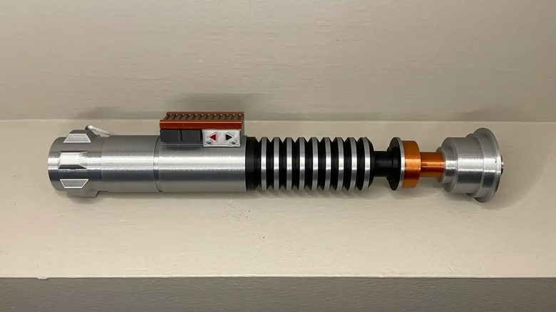A highly detailed 3D-printed replica of Luke Skywalker's lightsaber from Star Wars.