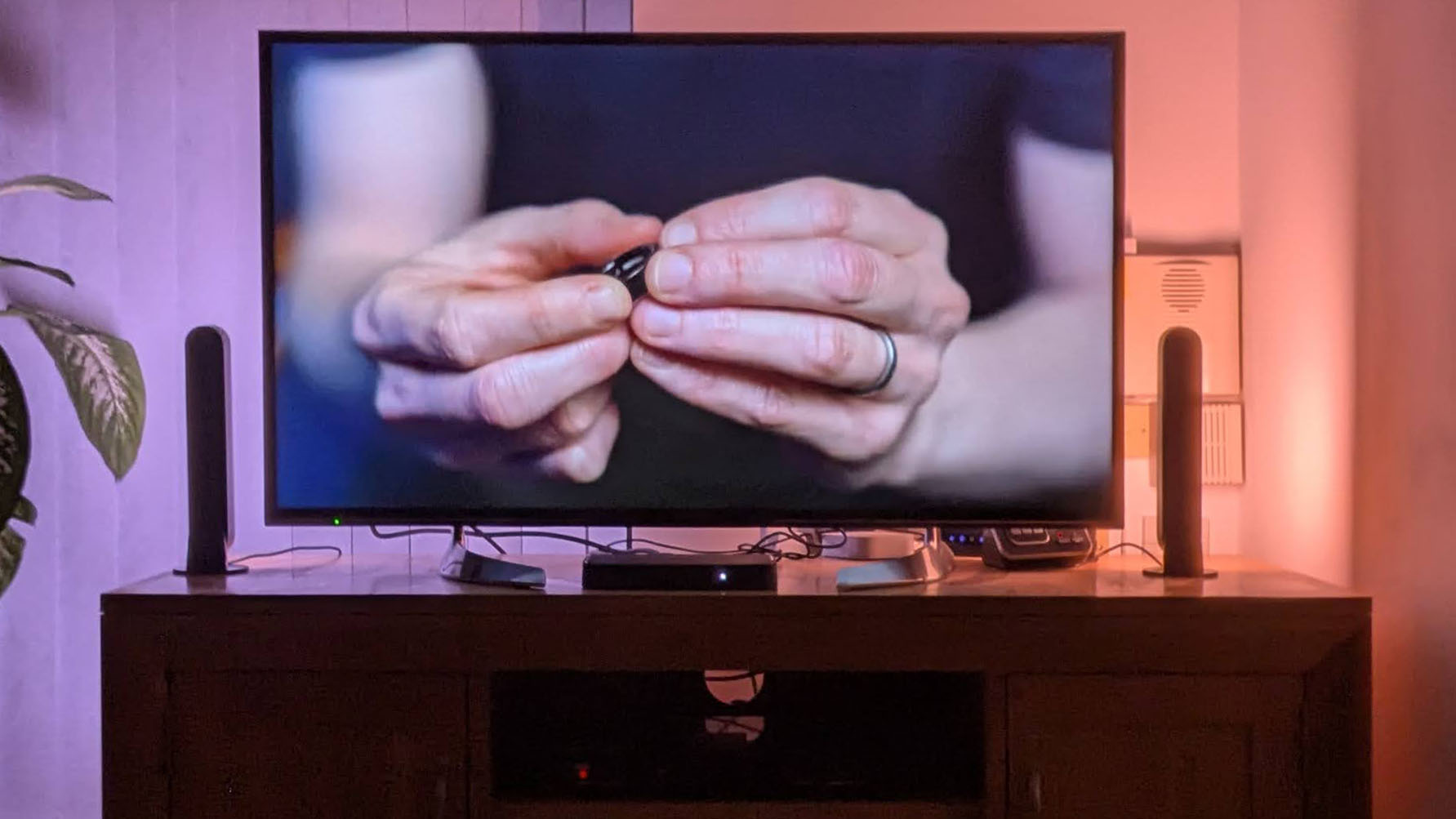 TV setup using Philips Hue Play Light Bars for ambient backlighting.