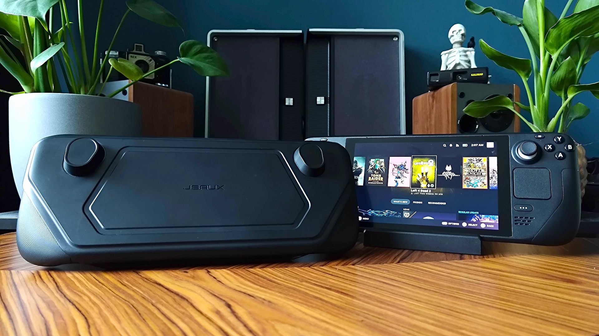 A Jsaux ModCase standing next to a Steam Deck console.