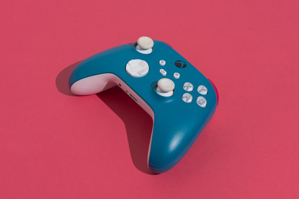 A standard blue Microsoft Xbox Wireless Controller on a neutral background.