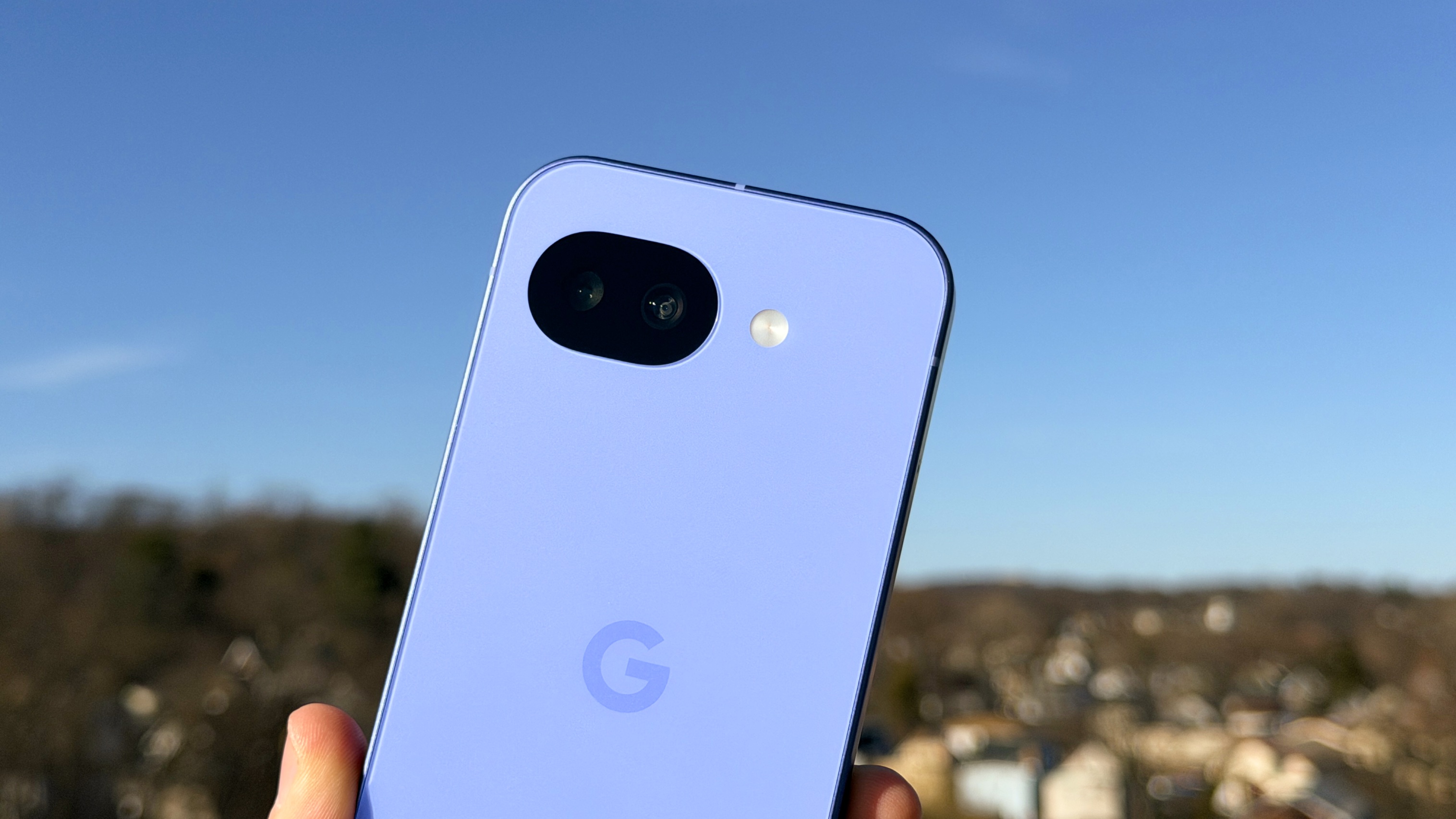 The Google Pixel 10a smartphone showing its simplified camera setup.