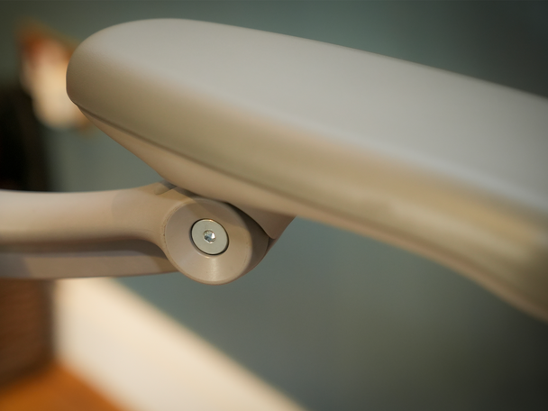 Close-up of the back support and mesh fabric on a Hinomi ergonomic chair.