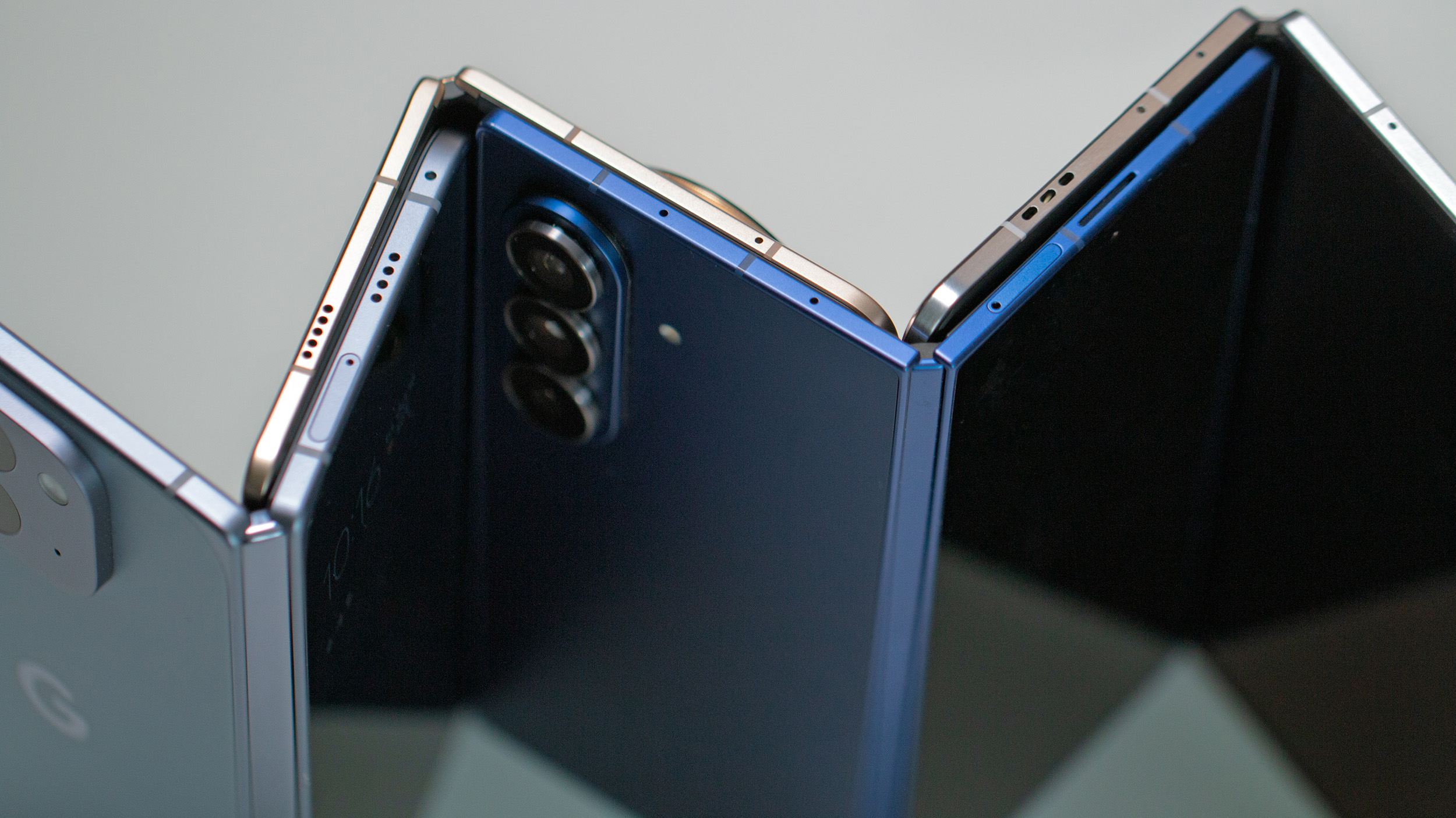 A close-up comparison of several different foldable phone hinges.