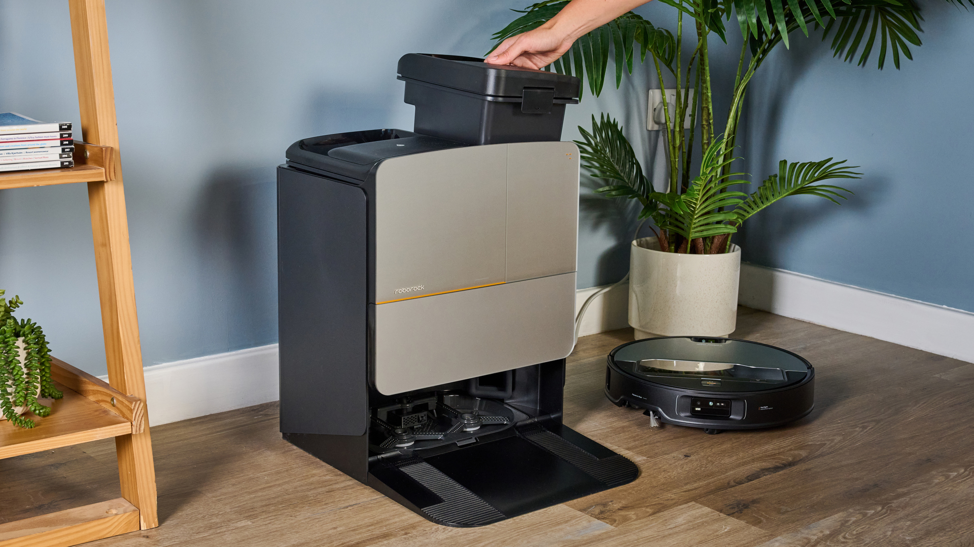 The large white automated docking station for the Roborock Saros Z70.