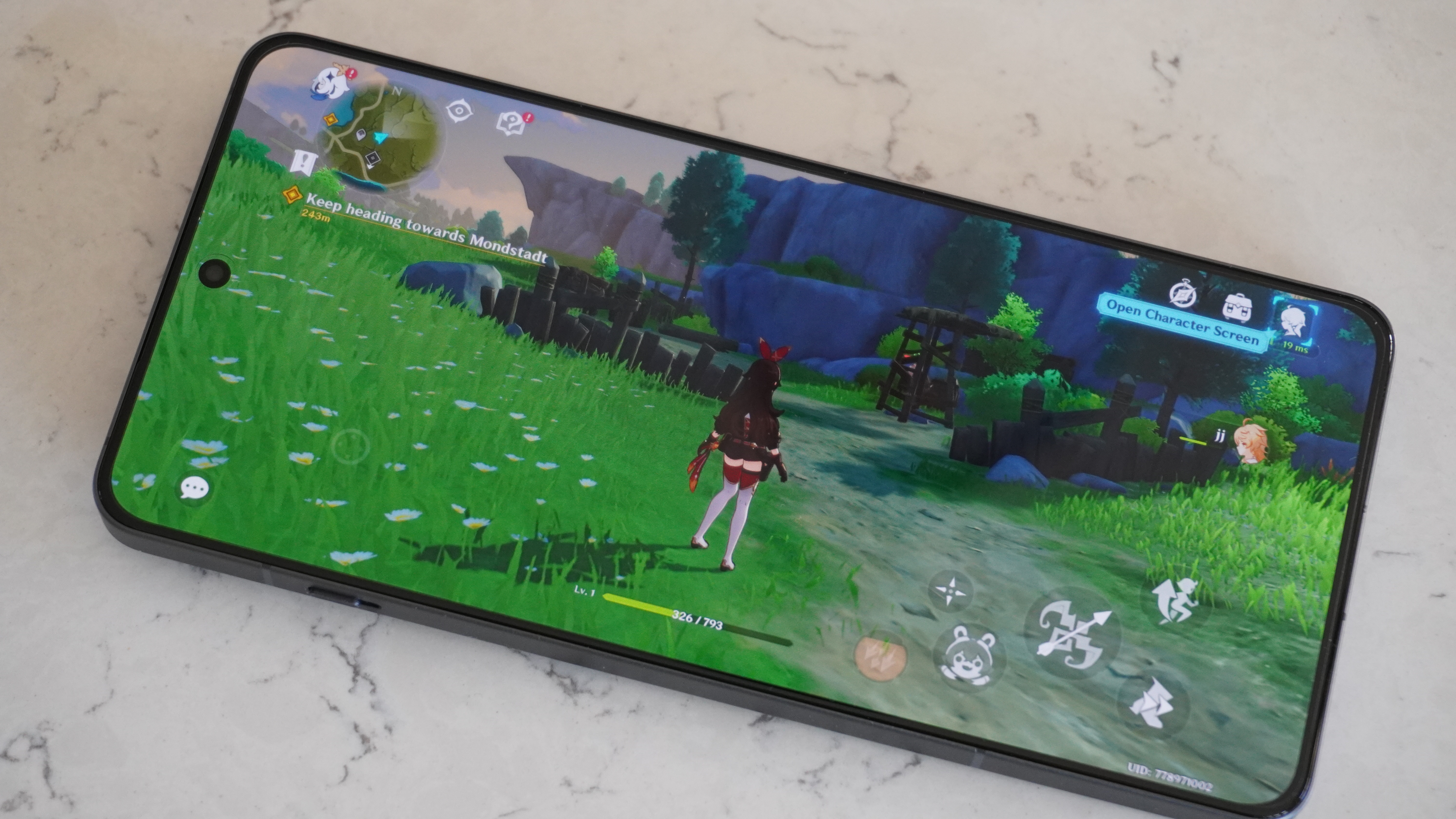 A person playing a graphically intensive game on the OnePlus 13R.