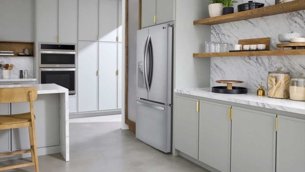A standard-depth French door refrigerator protruding several inches past the kitchen cabinets.