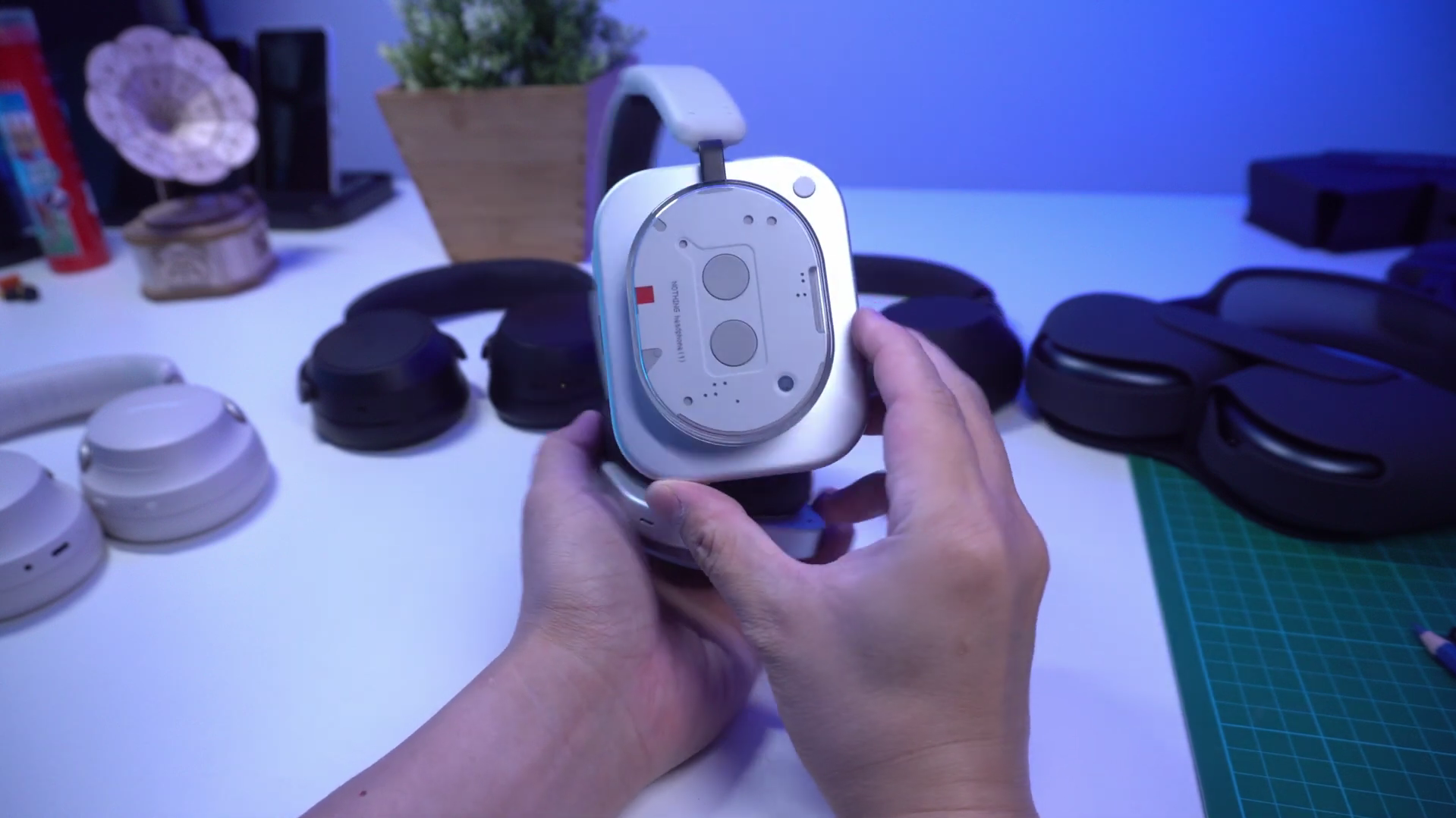 Macro view of the internal components visible through the transparent earcup of the Nothing Headphone (1).