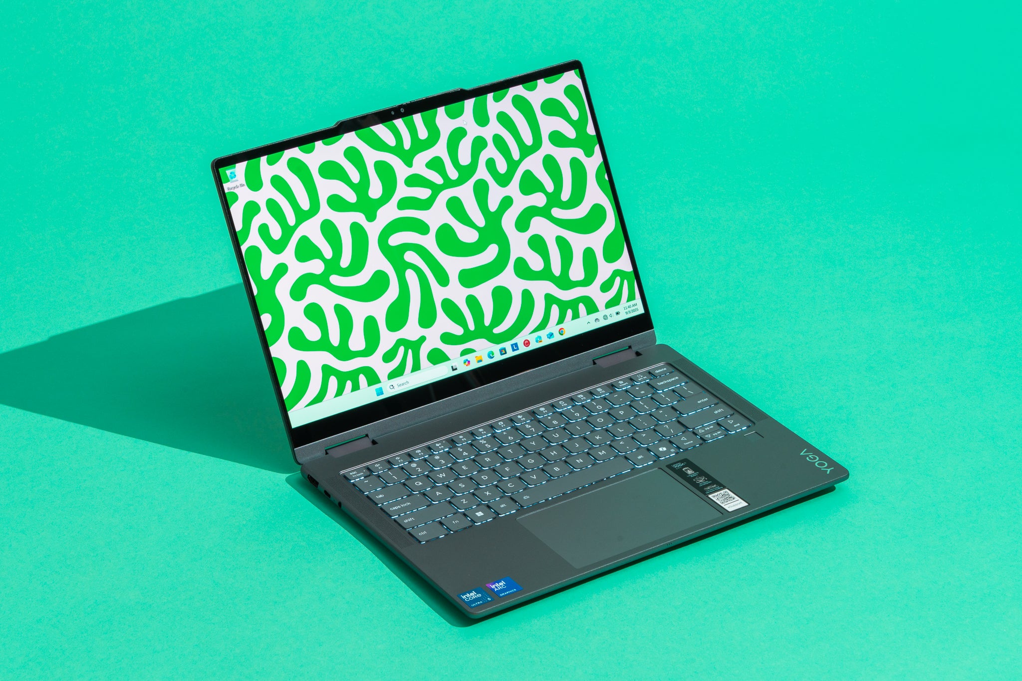 Lenovo 2-in-1 convertible laptop folded into tent mode.