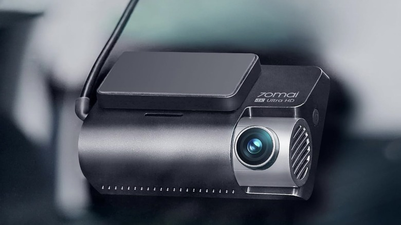 A 70mai A800S dash cam mounted on the inside of a car windshield near the rearview mirror.