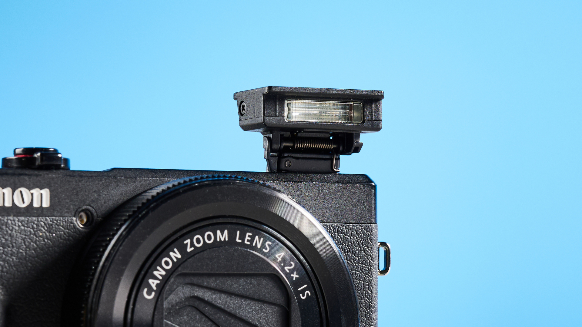 A sleek side view of the compact Canon PowerShot G7 X Mark III.