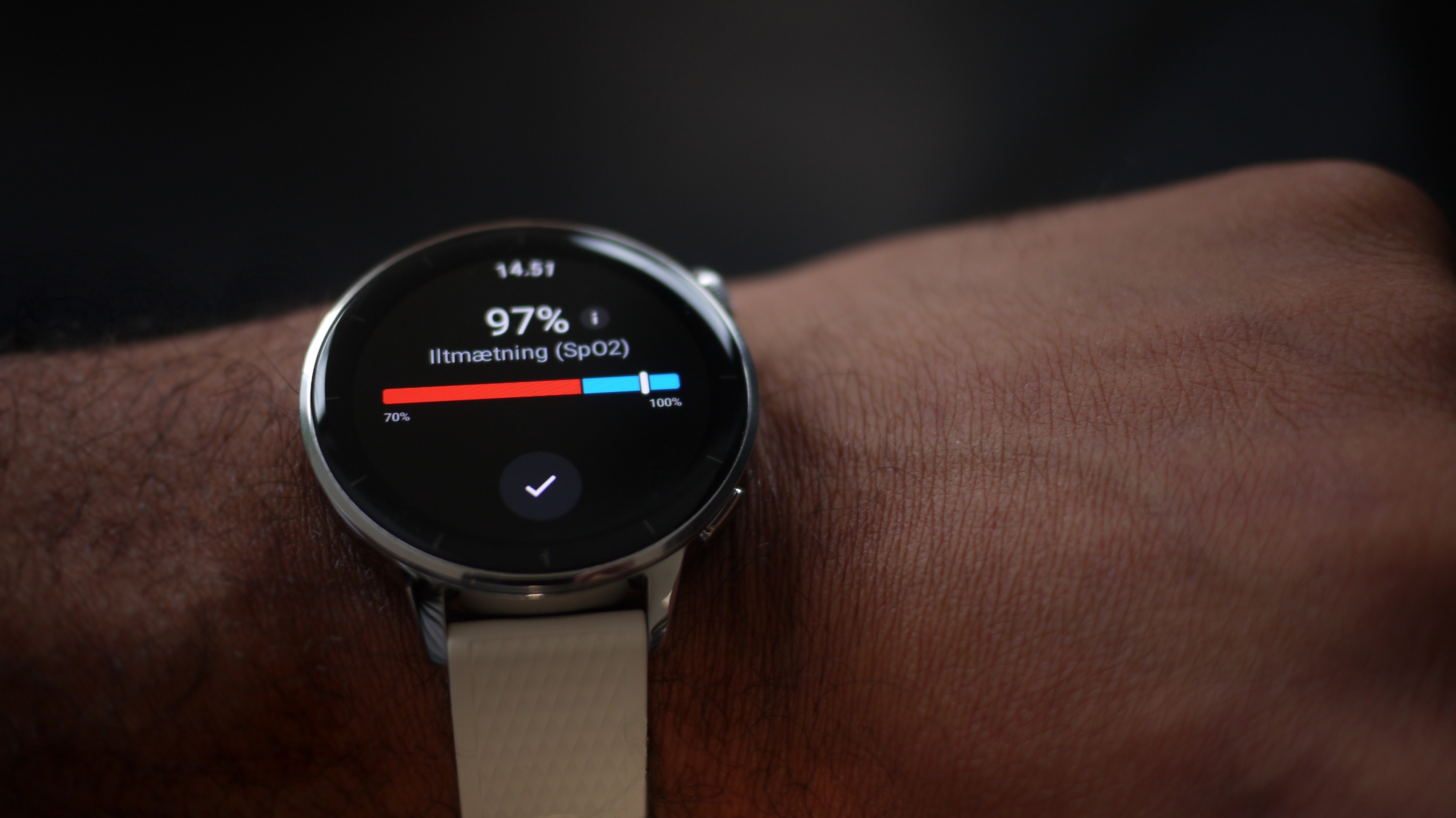 Close-up detail of the sleek design of a OnePlus Watch 3.