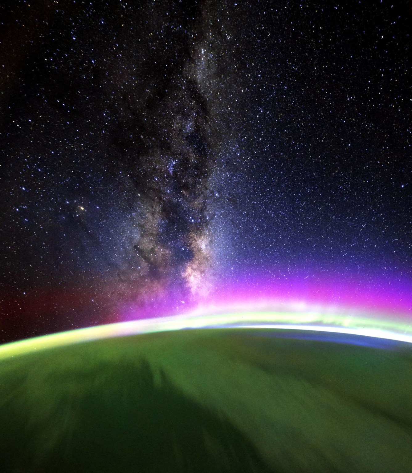 The colors of an orbital sunrise over the Earth's atmosphere as seen from space.