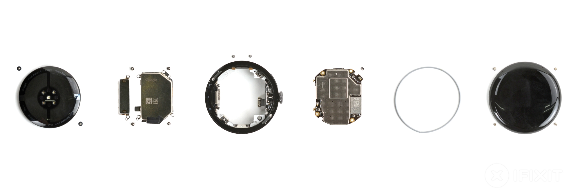 An exploded view showing all internal components of the Pixel Watch 4 laid out on a repair mat.
