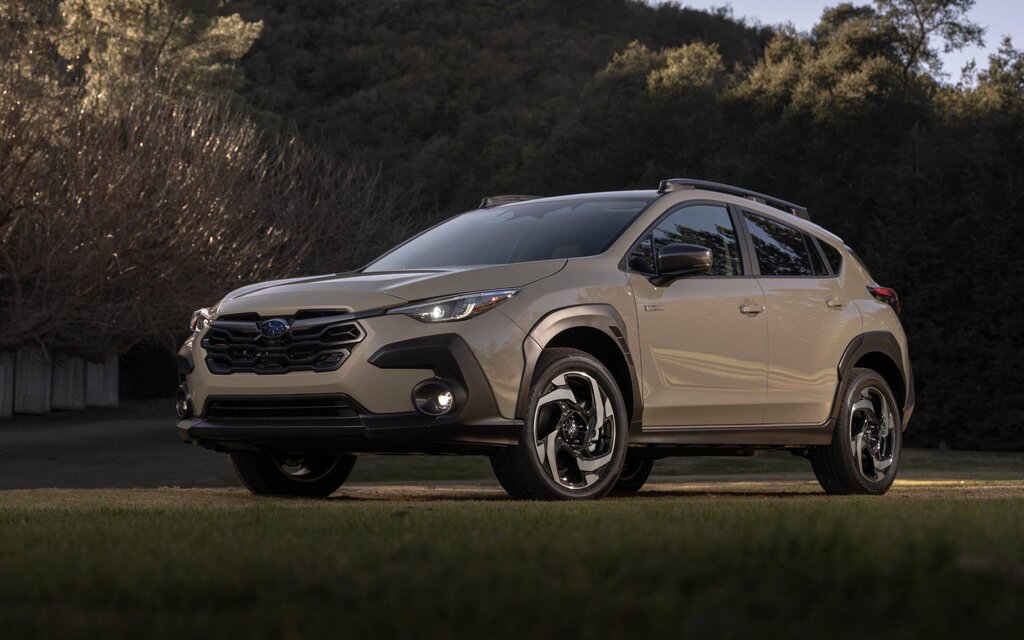 A Subaru Crosstrek compact SUV parked in a scenic outdoor environment.