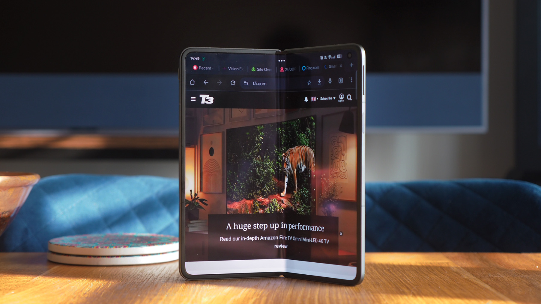 The Oppo Find N5 foldable phone in a partially unfolded state.