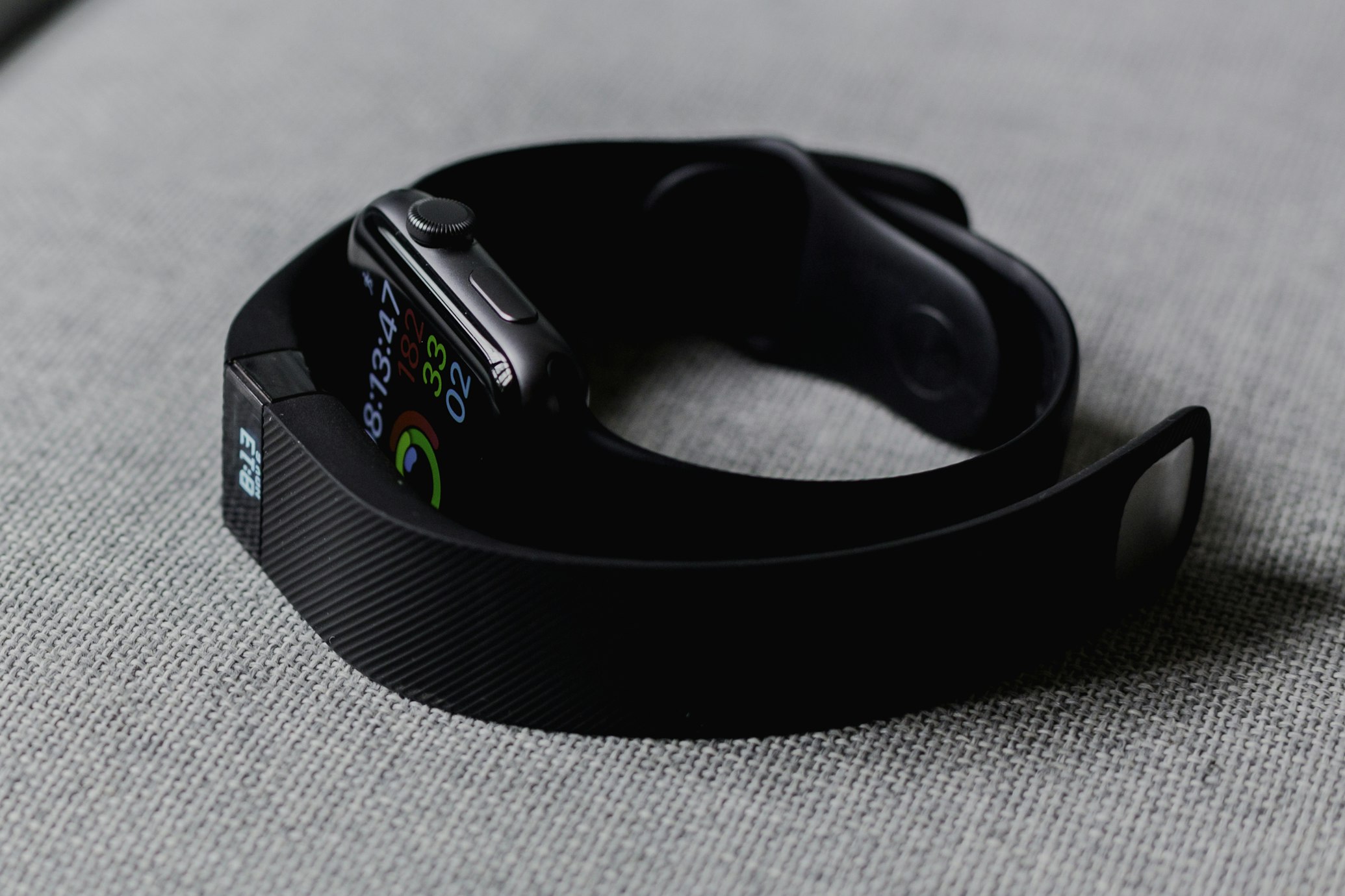 Close-up of a smartwatch displaying complex health and heart rate metrics.