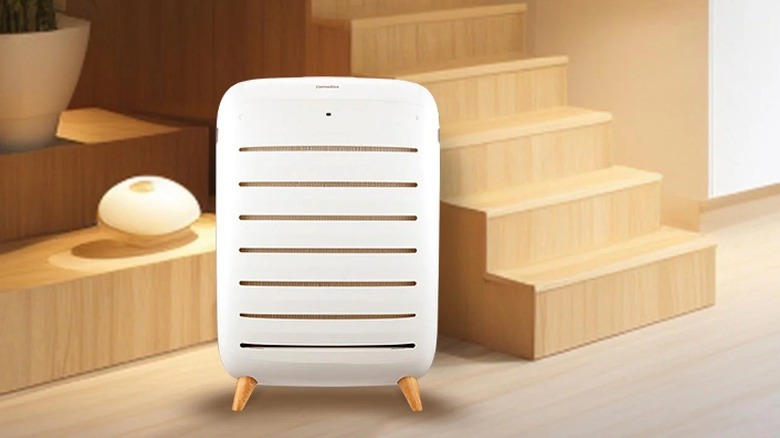 The HoMedics AP-C500 air purifier placed at the bottom of a staircase.
