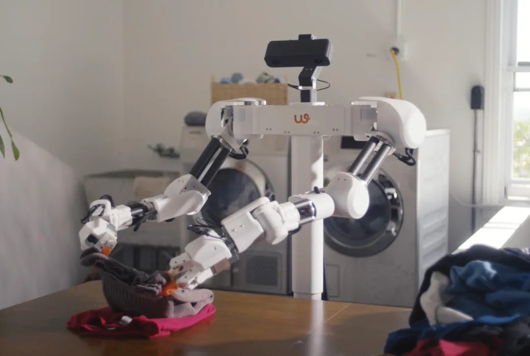 A modern, minimalist luxury interior with integrated smart technology displays.